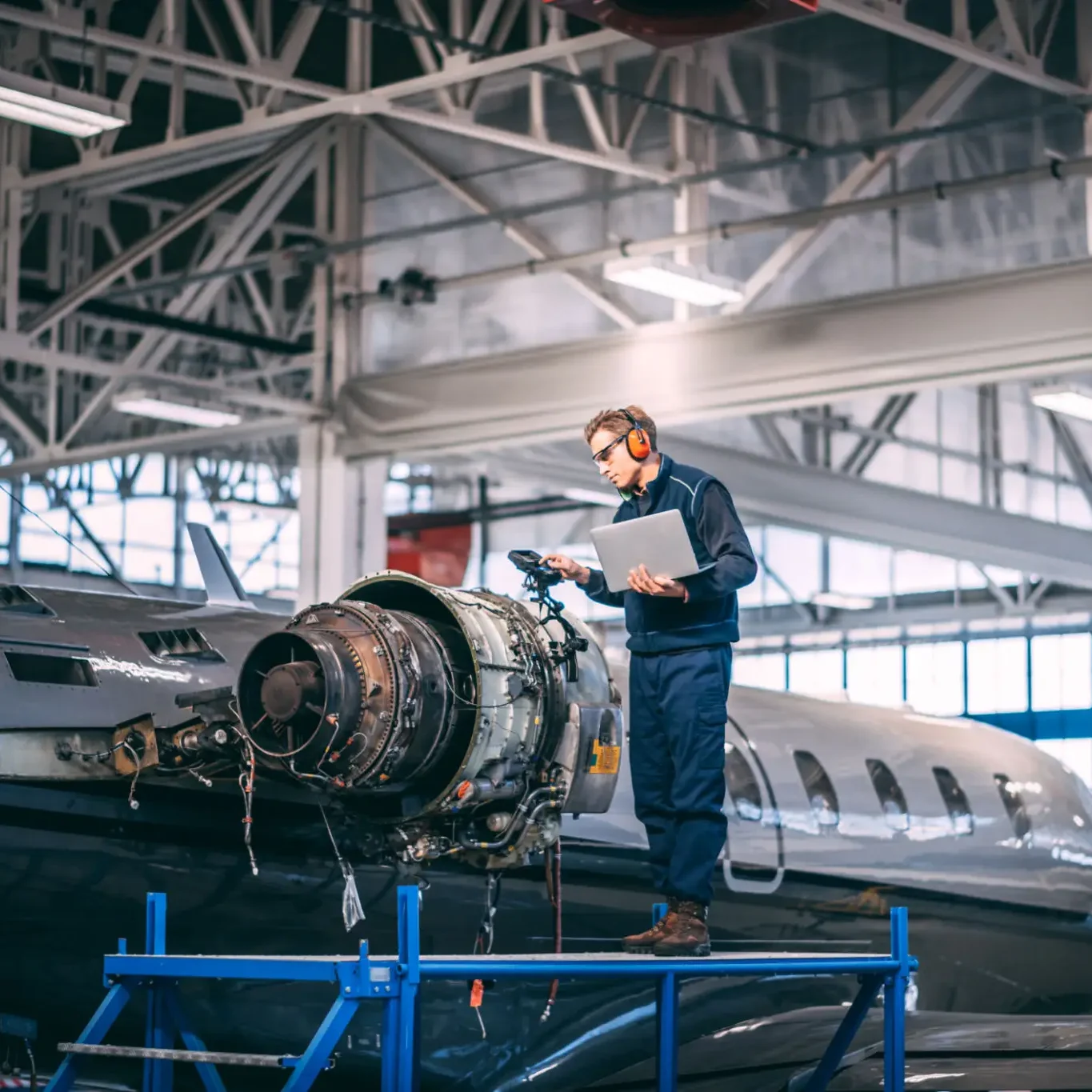 Engineer working on airplane maintenance